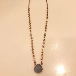 Gold choker with lavender stone